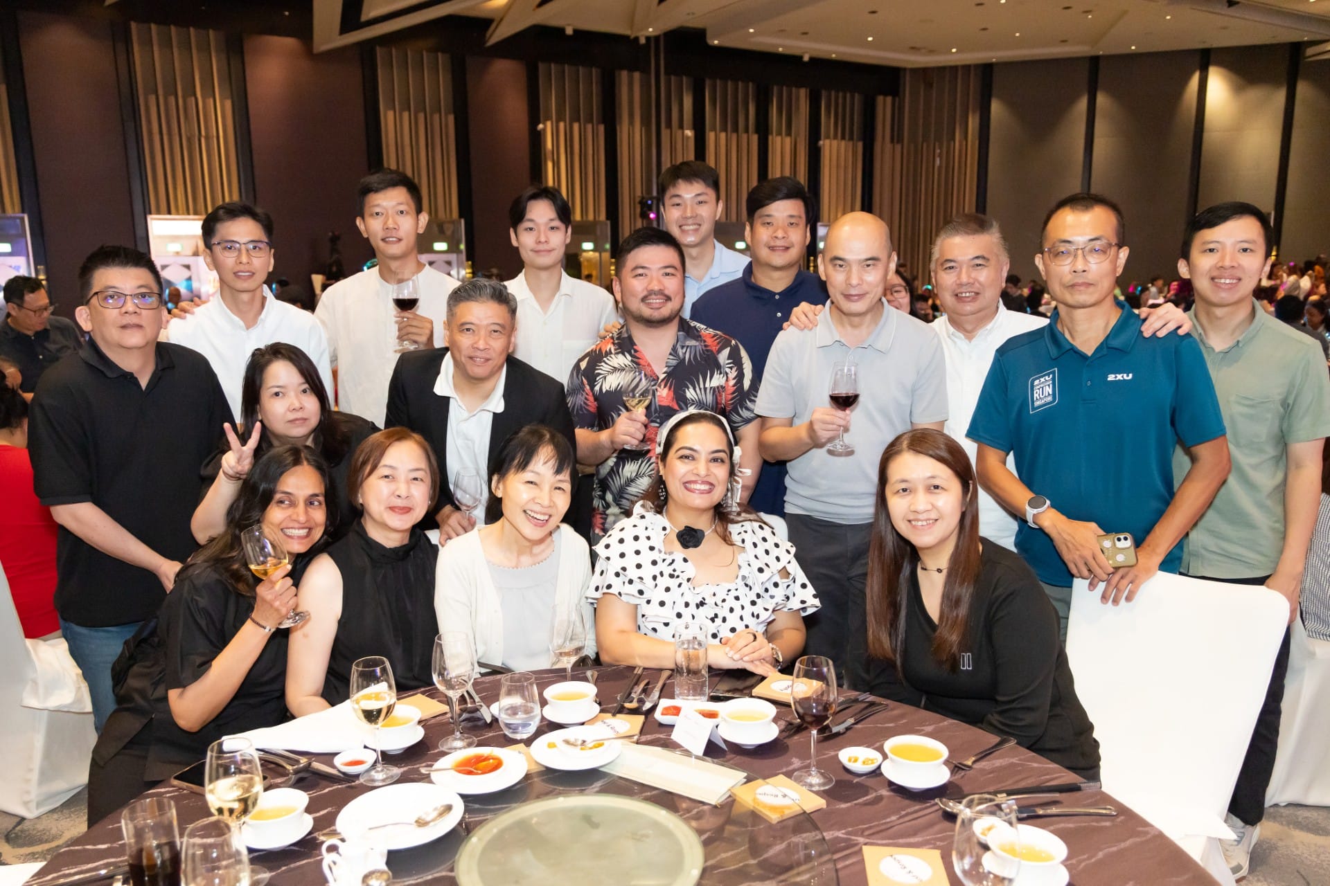 Photo of 18 ALPS staff taken at ALPS Anniversary Dinner